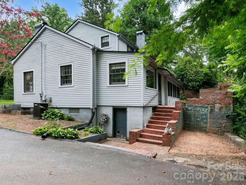 210 Baker Road, Tryon, NC 28782.  MLS# CAR4394297, YatesRealty ID 37896. 