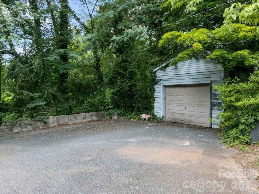 210 Baker Road, Tryon, NC 28782.  MLS# CAR4394297, YatesRealty ID 37896. 