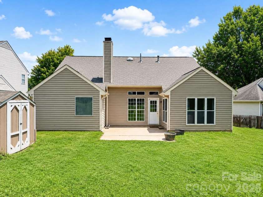 2855 Eagle View Place, Concord, NC 28027.  MLS# CAR4399165, YatesRealty ID 37899. Backyard 1/4