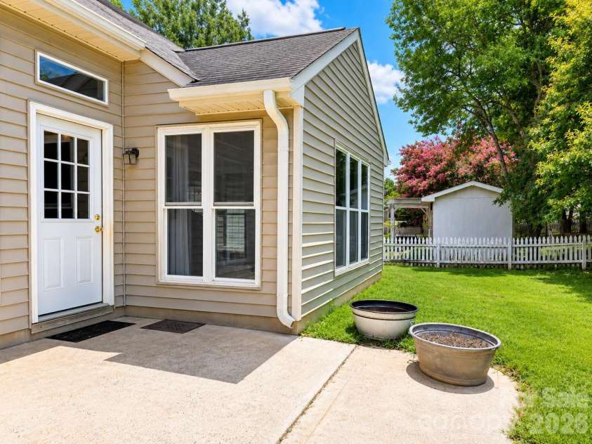 2855 Eagle View Place, Concord, NC 28027.  MLS# CAR4399165, YatesRealty ID 37899. Backyard 2/4