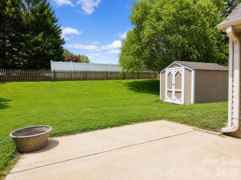 2855 Eagle View Place, Concord, NC 28027.  MLS# CAR4399165, YatesRealty ID 37899. Backyard 4/4