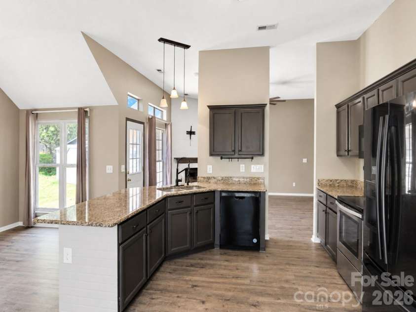 2855 Eagle View Place, Concord, NC 28027.  MLS# CAR4399165, YatesRealty ID 37899. Modern kitchen 3/4