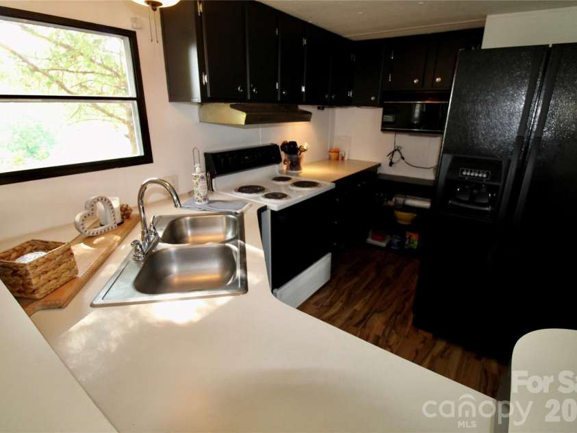 535 Lake Shore Drive, New London, NC 28127.  MLS# CAR4403928, YatesRealty ID 37902. 