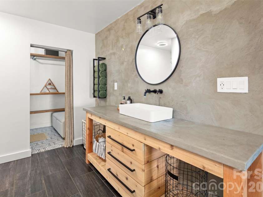 354 Boulder View Drive, Flat Rock, NC 28731.  MLS# CAR4403258, YatesRealty ID 37905. Updated bathroom