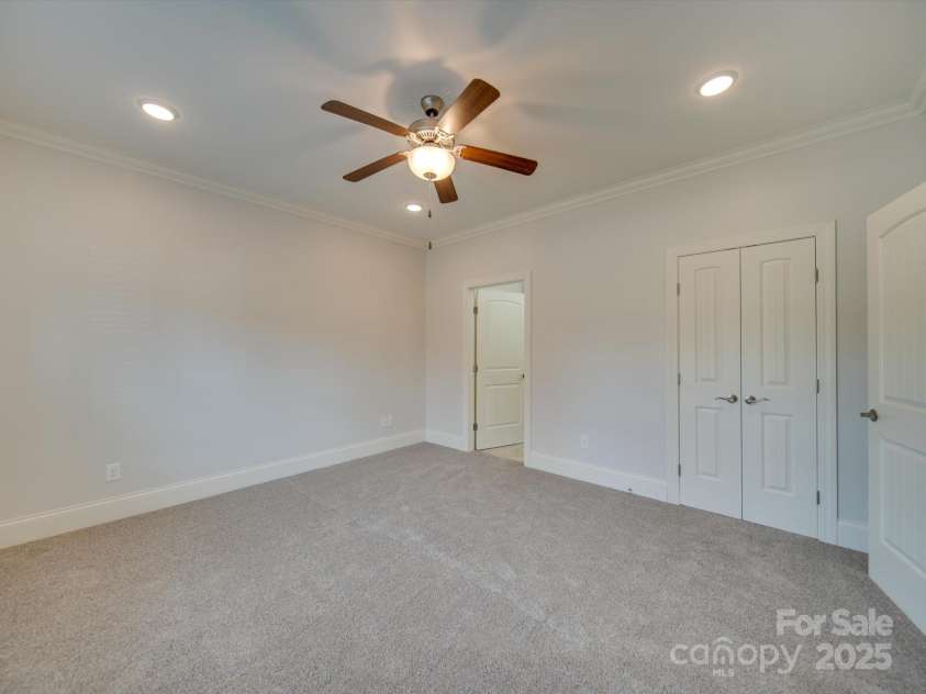 15334 Birkdale Commons Parkway, Huntersville, NC 28078.  MLS# CAR4207665, YatesRealty ID 3791. Primary Bedroom on Main Level