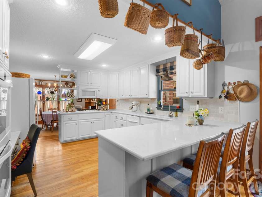 1615 Eastwood Drive, Kannapolis, NC 28081.  MLS# CAR4347467, YatesRealty ID 3791. Kitchen looking into breakfast area