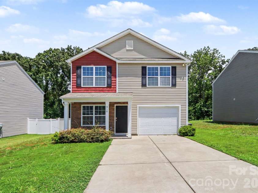 310 Kingsford Drive, Stanley, NC 28164.  MLS# CAR4400766, YatesRealty ID 37928. Front covered porch