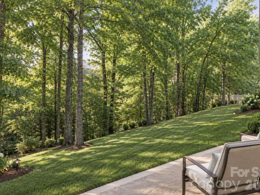 12036 Humboldt Drive, Charlotte, NC 28277.  MLS# CAR4400878, YatesRealty ID 37929. AI Generated backyard - for inspiration