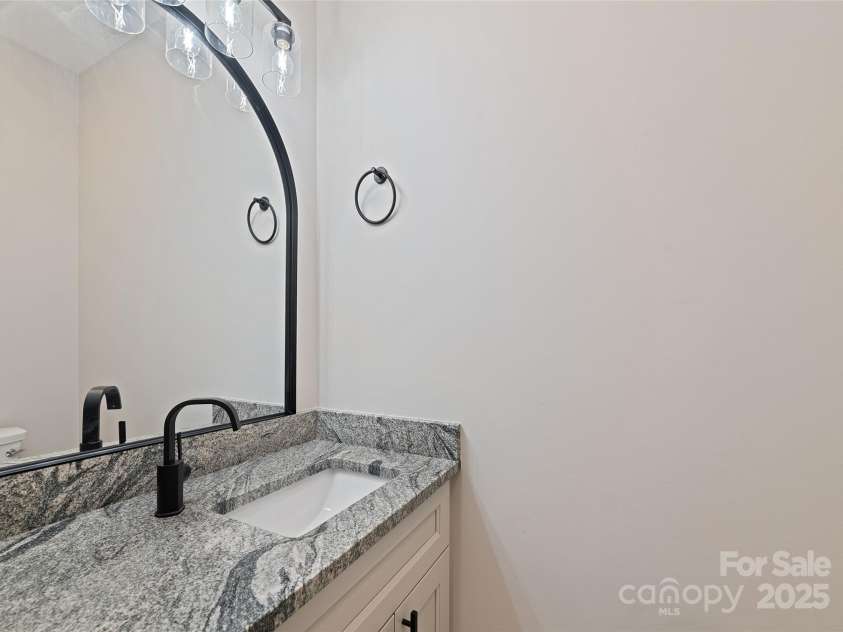 148 Amblers Knoll Road, Weaverville, NC 28787.  MLS# CAR4253906, YatesRealty ID 3793. Half Bathroom Main Floor