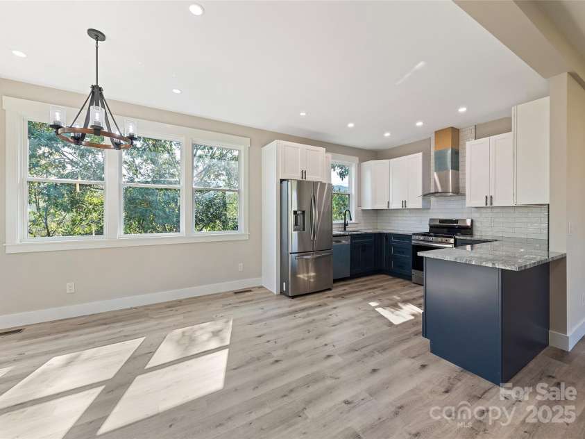 148 Amblers Knoll Road, Weaverville, NC 28787.  MLS# CAR4253906, YatesRealty ID 3793. Kitchen & Dining