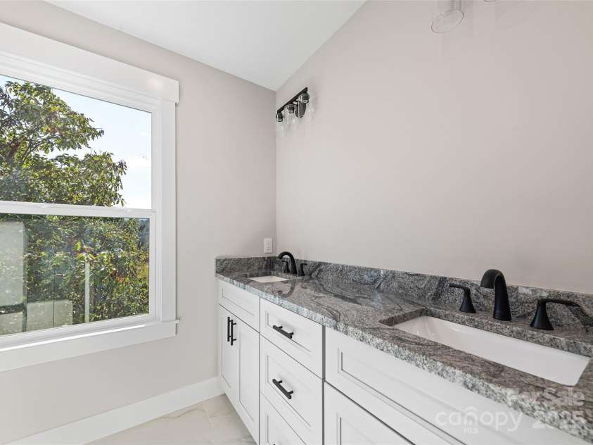 148 Amblers Knoll Road, Weaverville, NC 28787.  MLS# CAR4253906, YatesRealty ID 3793. Primary Bathroom One