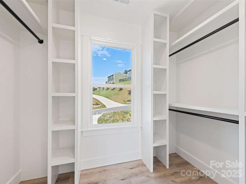 148 Amblers Knoll Road, Weaverville, NC 28787.  MLS# CAR4253906, YatesRealty ID 3793. Primary Bedroom Closet One