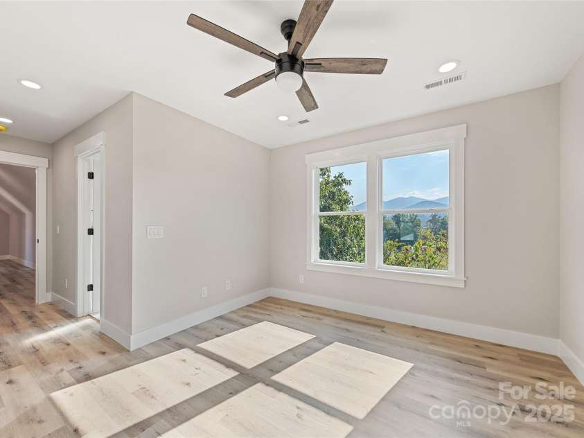 148 Amblers Knoll Road, Weaverville, NC 28787.  MLS# CAR4253906, YatesRealty ID 3793. Primary Bedroom One