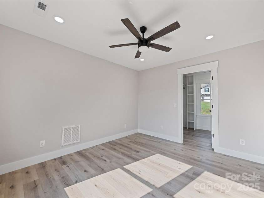 148 Amblers Knoll Road, Weaverville, NC 28787.  MLS# CAR4253906, YatesRealty ID 3793. Primary Bedroom One