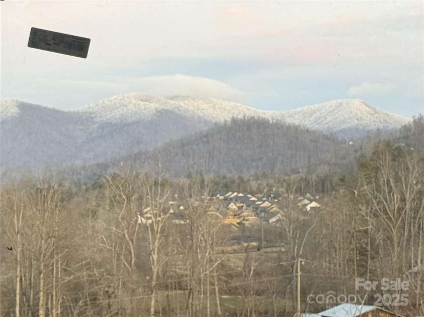 148 Amblers Knoll Road, Weaverville, NC 28787.  MLS# CAR4253906, YatesRealty ID 3793. Winter View from kitchen 