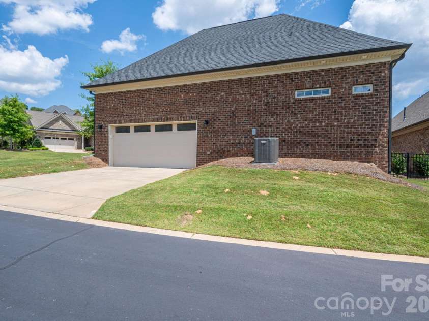 5247 Courtyard Lane, Belmont, NC 28012.  MLS# CAR4404937, YatesRealty ID 37931. Spacious garage with epoxy flooring.