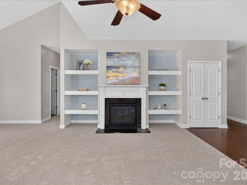 1030 Kaiser Way, Fort Mill, SC 29715.  MLS# CAR4397966, YatesRealty ID 37936. Great Room Built in Cabinets