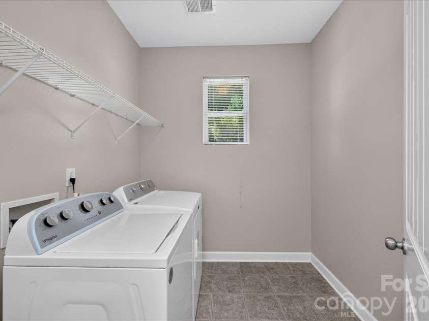 1030 Kaiser Way, Fort Mill, SC 29715.  MLS# CAR4397966, YatesRealty ID 37936. Main Level Laundry