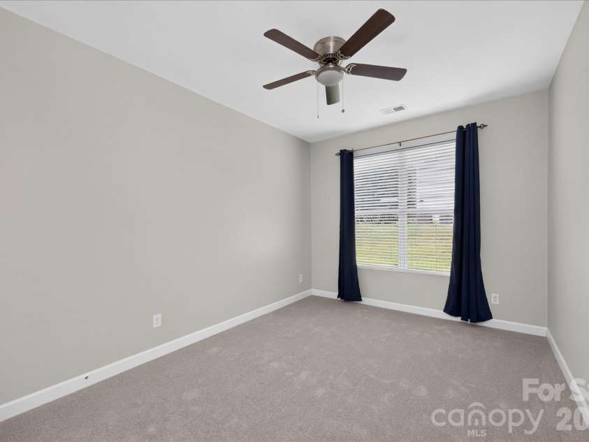 1030 Kaiser Way, Fort Mill, SC 29715.  MLS# CAR4397966, YatesRealty ID 37936. Main Level Secondary Bedroom