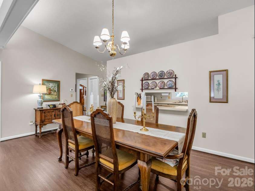 251 Carolina Drive, Tryon, NC 28782.  MLS# CAR4405426, YatesRealty ID 37939. Dining area with pass through to the kitchen