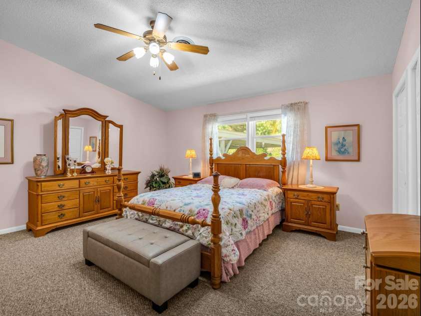 251 Carolina Drive, Tryon, NC 28782.  MLS# CAR4405426, YatesRealty ID 37939. Primary bedroom