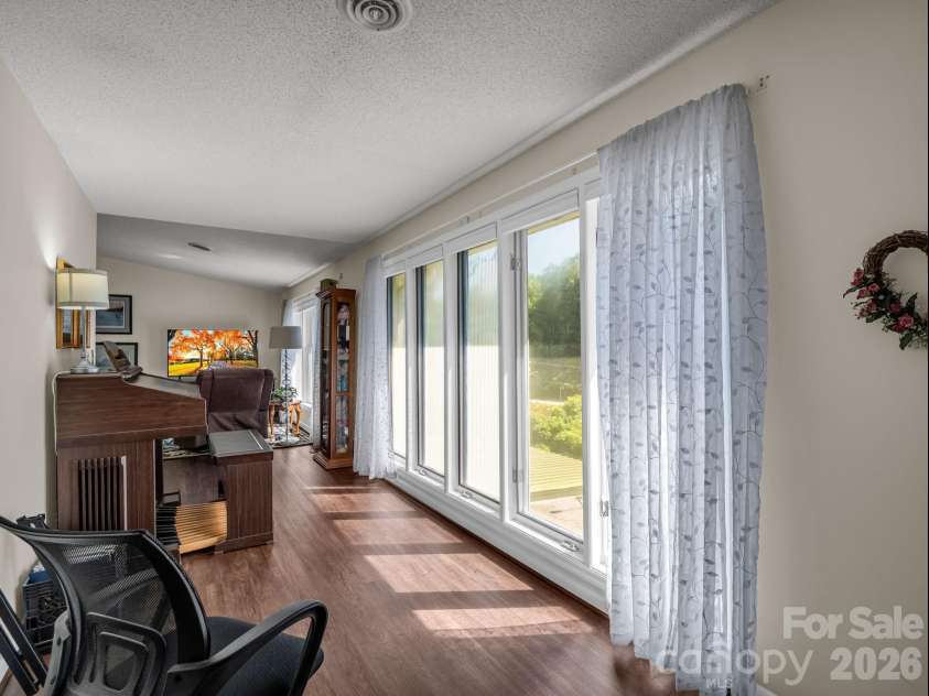 251 Carolina Drive, Tryon, NC 28782.  MLS# CAR4405426, YatesRealty ID 37939. Study area with built-ins