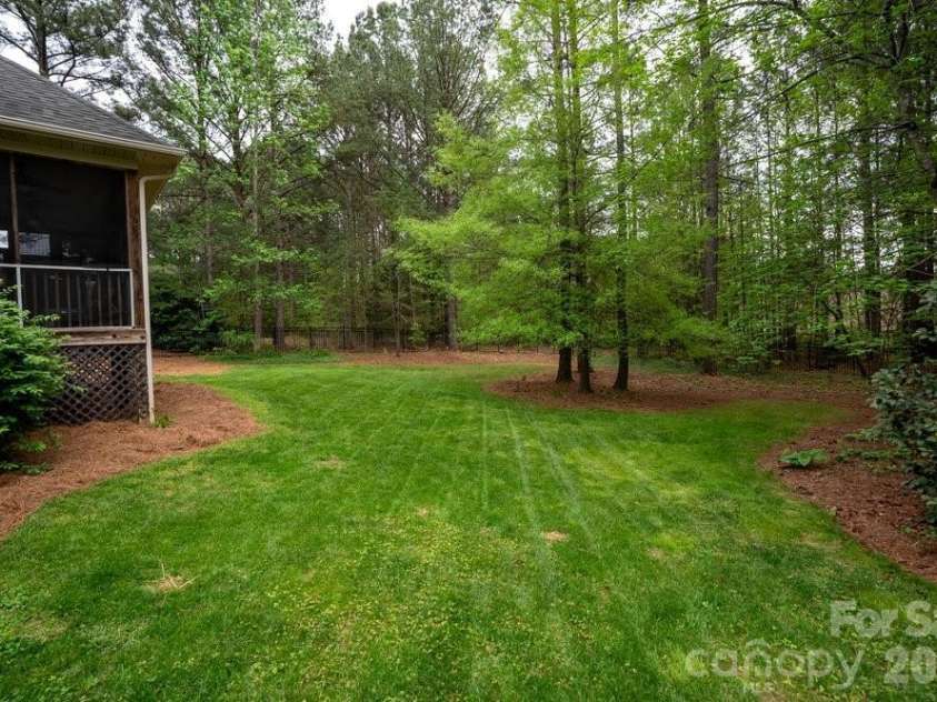 147 Honeysuckle Creek Loop, Mooresville, NC 28117.  MLS# CAR4368793, YatesRealty ID 37940. Back Yard w/ Park-Like Feel