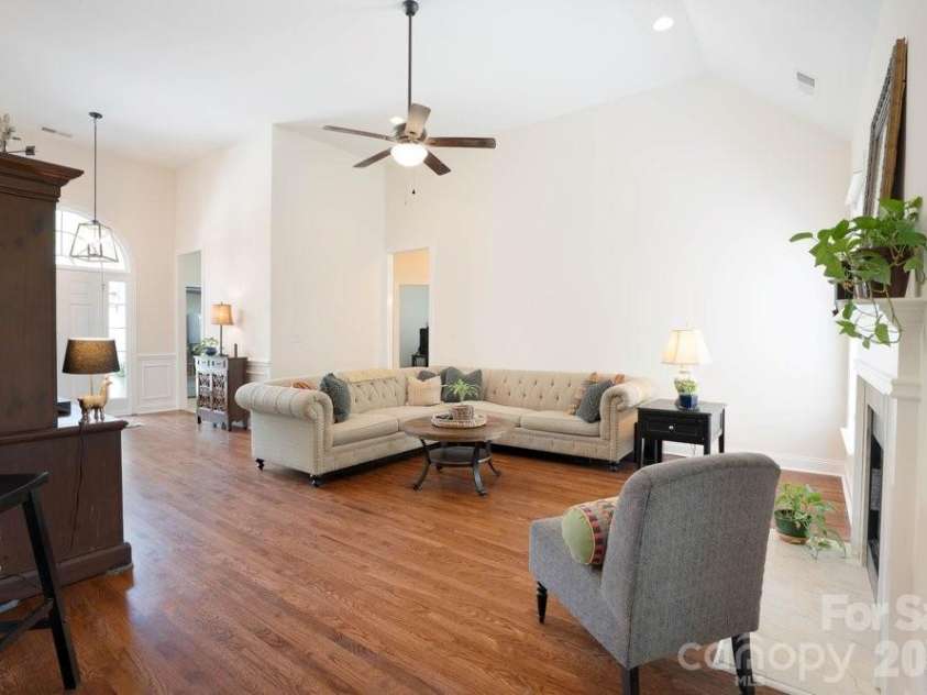 147 Honeysuckle Creek Loop, Mooresville, NC 28117.  MLS# CAR4368793, YatesRealty ID 37940. Entry into Living Room