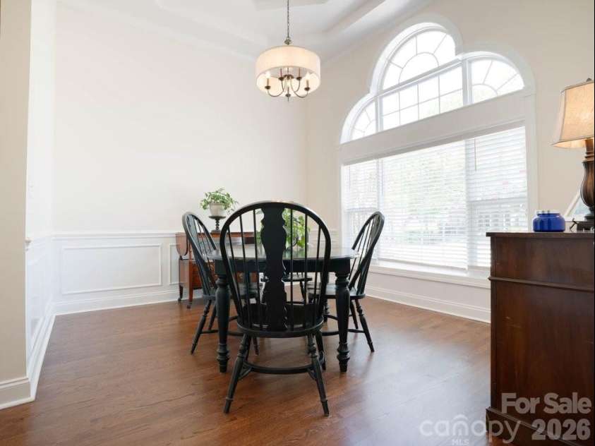 147 Honeysuckle Creek Loop, Mooresville, NC 28117.  MLS# CAR4368793, YatesRealty ID 37940. Expansive Windows Envelops the Dining Room with Natural Light
