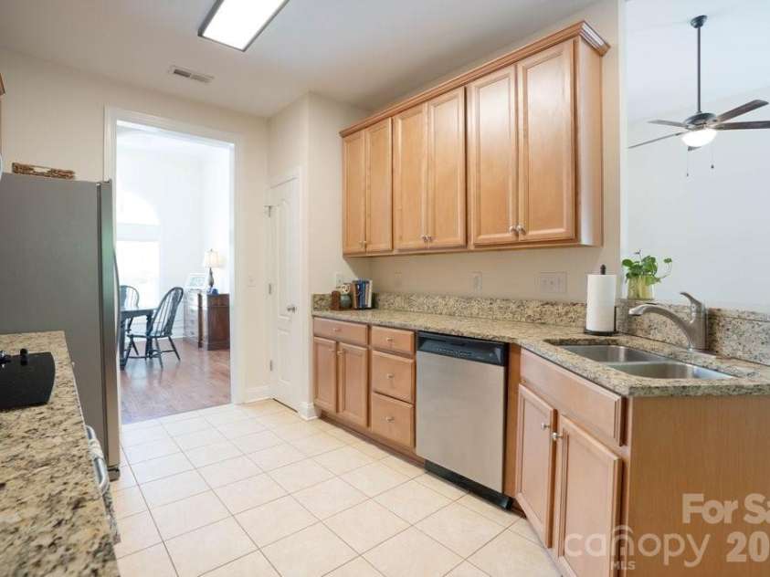 147 Honeysuckle Creek Loop, Mooresville, NC 28117.  MLS# CAR4368793, YatesRealty ID 37940. Kitchen Opens to Living Room