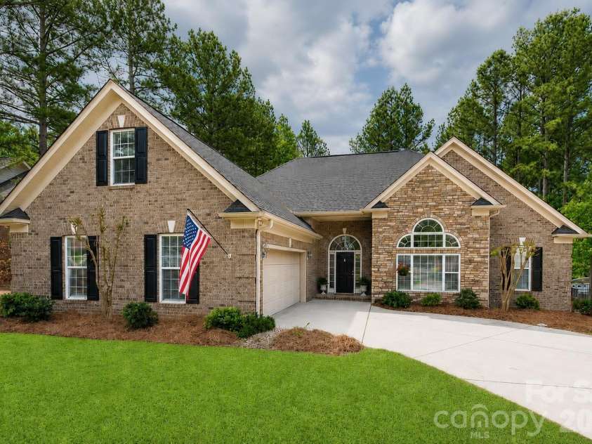 147 Honeysuckle Creek Loop, Mooresville, NC 28117.  MLS# CAR4368793, YatesRealty ID 37940. Welcome Home - Custom Brick Home