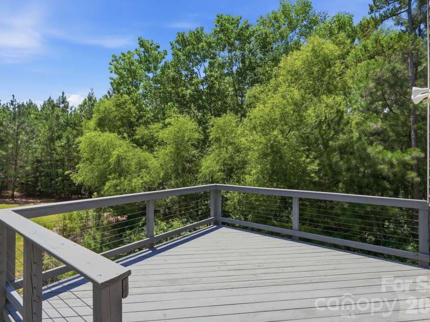 4870 Summerside Drive, Clover, SC 29710.  MLS# CAR4394846, YatesRealty ID 37943. Deck off of main level
