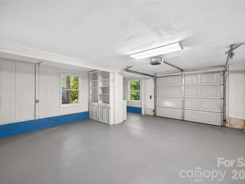 2087 Marquesas Avenue, Tega Cay, SC 29708.  MLS# CAR4403387, YatesRealty ID 37956. Garage with workspace