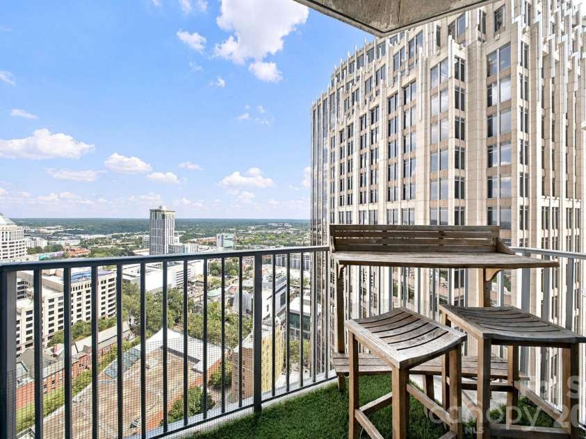 210 Church Street, Charlotte, NC 28202.  MLS# CAR4424880, YatesRealty ID 37967. 