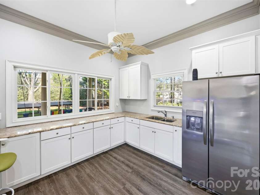 9805 Strike The Gold Lane, Waxhaw, NC 28173.  MLS# CAR4407755, YatesRealty ID 37969. Pool House Kitchen