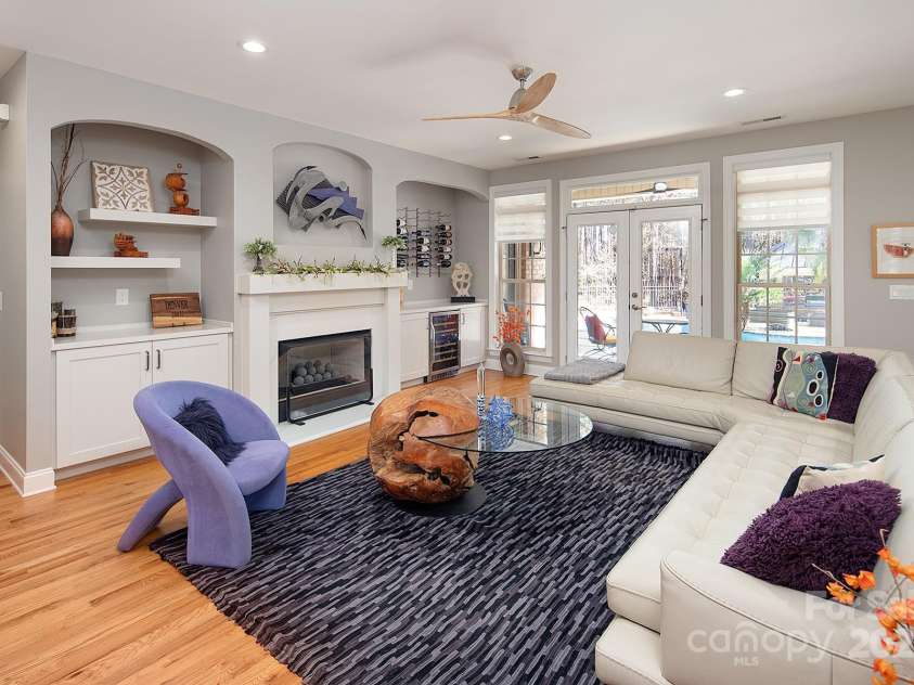 4706 Gold Finch Drive, Denver, NC 28037.  MLS# CAR4237582, YatesRealty ID 3797. Built ins flank the fireplace including a wine/beverage refrigerator