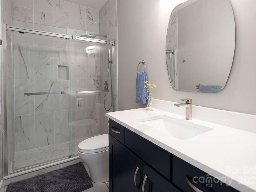 4706 Gold Finch Drive, Denver, NC 28037.  MLS# CAR4237582, YatesRealty ID 3797. Full Bath 2 has new cabinets, quartz counters, tiled shower/floors, new faucet