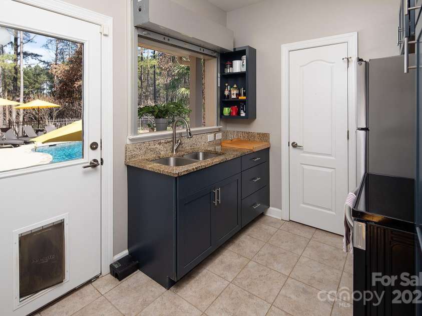 4706 Gold Finch Drive, Denver, NC 28037.  MLS# CAR4237582, YatesRealty ID 3797. Kitchenette has new appliances, new cabinets