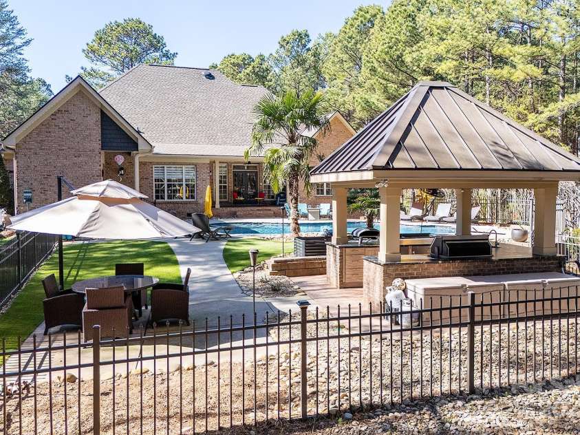 4706 Gold Finch Drive, Denver, NC 28037.  MLS# CAR4237582, YatesRealty ID 3797. Pet friendly AstroTurf in fenced in Backyard