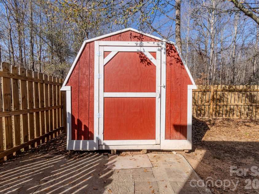 5739 Pug Lane, Iron Station, NC 28080.  MLS# CAR4327014, YatesRealty ID 3797. Huge Shed