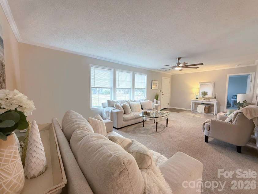 5739 Pug Lane, Iron Station, NC 28080.  MLS# CAR4327014, YatesRealty ID 3797. Spacious Living Room