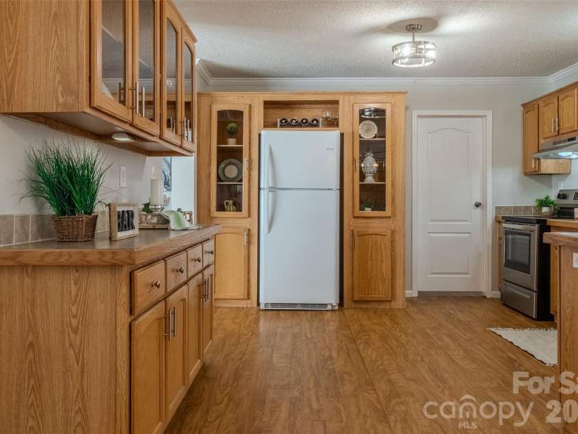 5739 Pug Lane, Iron Station, NC 28080.  MLS# CAR4327014, YatesRealty ID 3797. Tons of cabinet & counter space!
