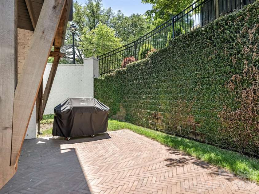 2115 Nolen Ridge Avenue, Charlotte, NC 28209.  MLS# CAR4387501, YatesRealty ID 37972. Private terrace