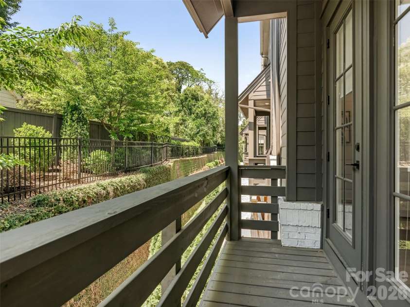 2115 Nolen Ridge Avenue, Charlotte, NC 28209.  MLS# CAR4387501, YatesRealty ID 37972. Step outside to main level balcony