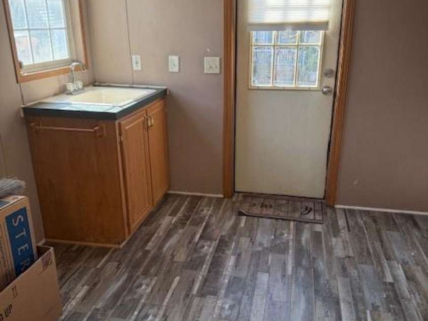 127 Knight N Gail Drive, Mooresville, NC 28115.  MLS# CAR4341014, YatesRealty ID 3799. Extra large sink in Laundry room