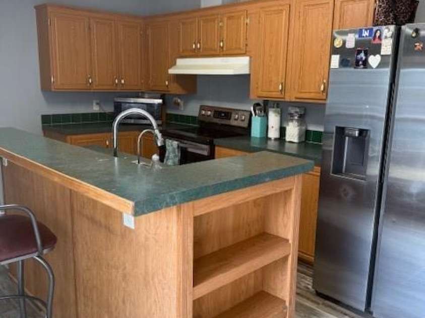 127 Knight N Gail Drive, Mooresville, NC 28115.  MLS# CAR4341014, YatesRealty ID 3799. Island has great place for bar stools seating