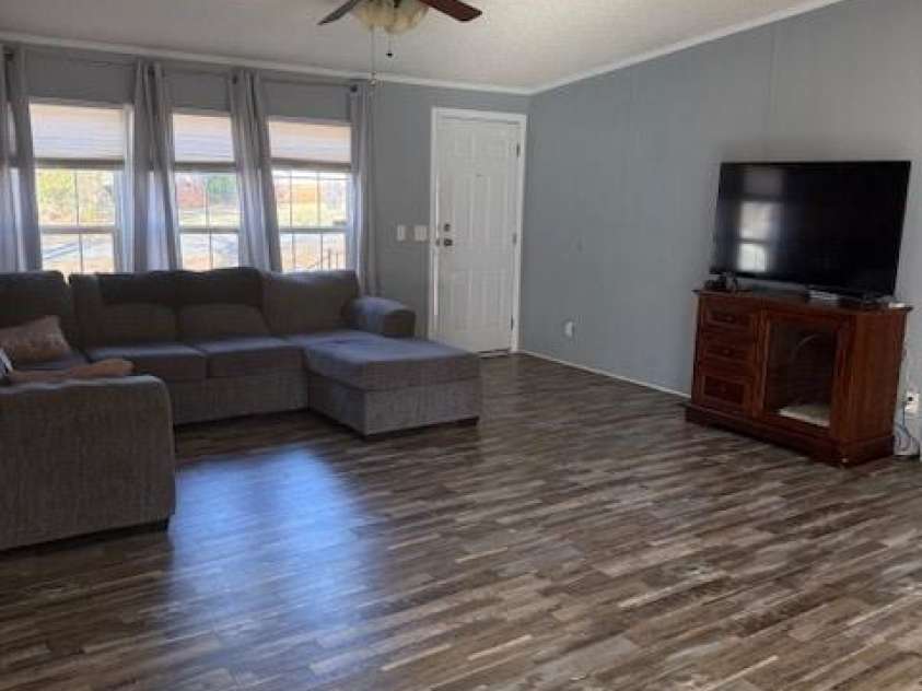 127 Knight N Gail Drive, Mooresville, NC 28115.  MLS# CAR4341014, YatesRealty ID 3799. Newly updated laminated wood flooring