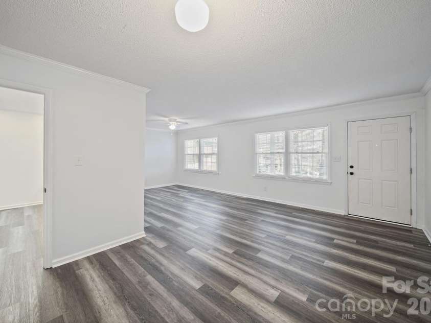 855 Nottingham Drive, Gastonia, NC 28054.  MLS# CAR4332279, YatesRealty ID 3799. Living/Dining