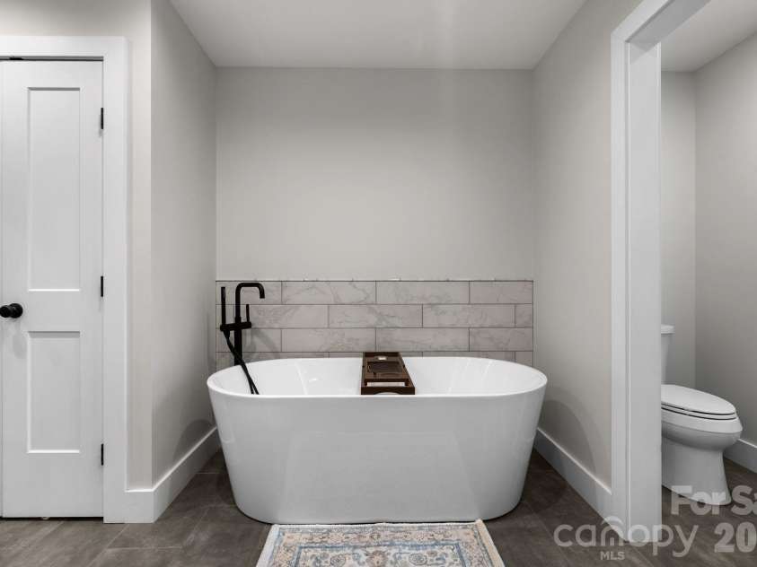 239 Windsor Forest Circle, Fletcher, NC 28732.  MLS# CAR4402613, YatesRealty ID 37991. Primary Bath
