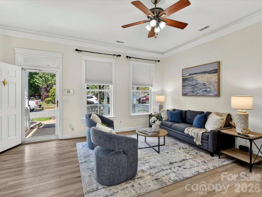 13106 Kennerly Drive, Huntersville, NC 28078.  MLS# CAR4402460, YatesRealty ID 37992. Designed for both comfort and functionality, the light-filled Great Room features a gas fireplace, crown molding, and an open layout that flows effortlessly into the home's gathering spaces.
